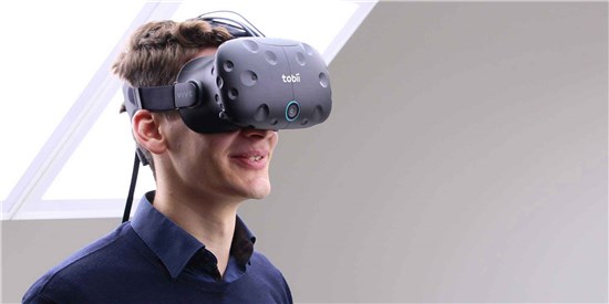 Picture of a man wearing a virtual reality headset